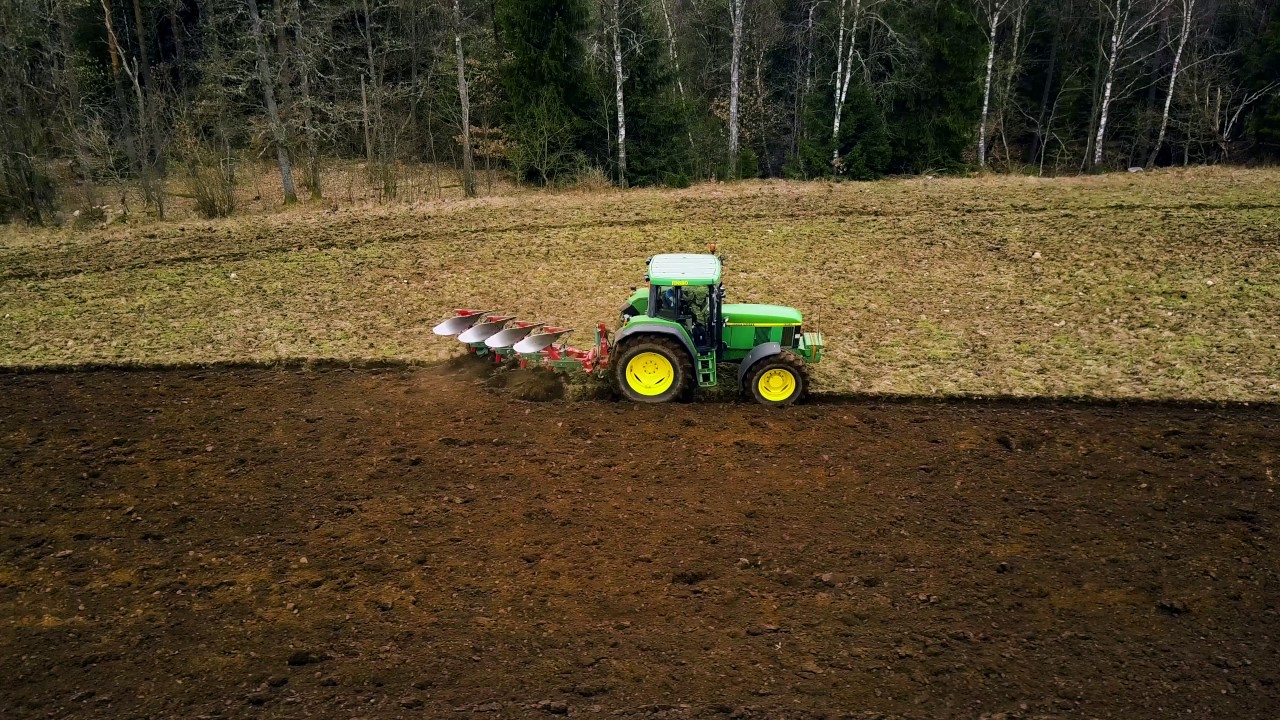 John Deere 6910 ploughing, in 4K