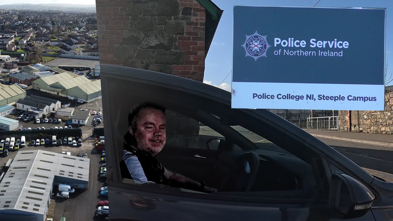 OFF DUTY PSNI OFFICER SEES CAMERA AND DRIVES OFF!!!! - PSNI Training Campus Steeple