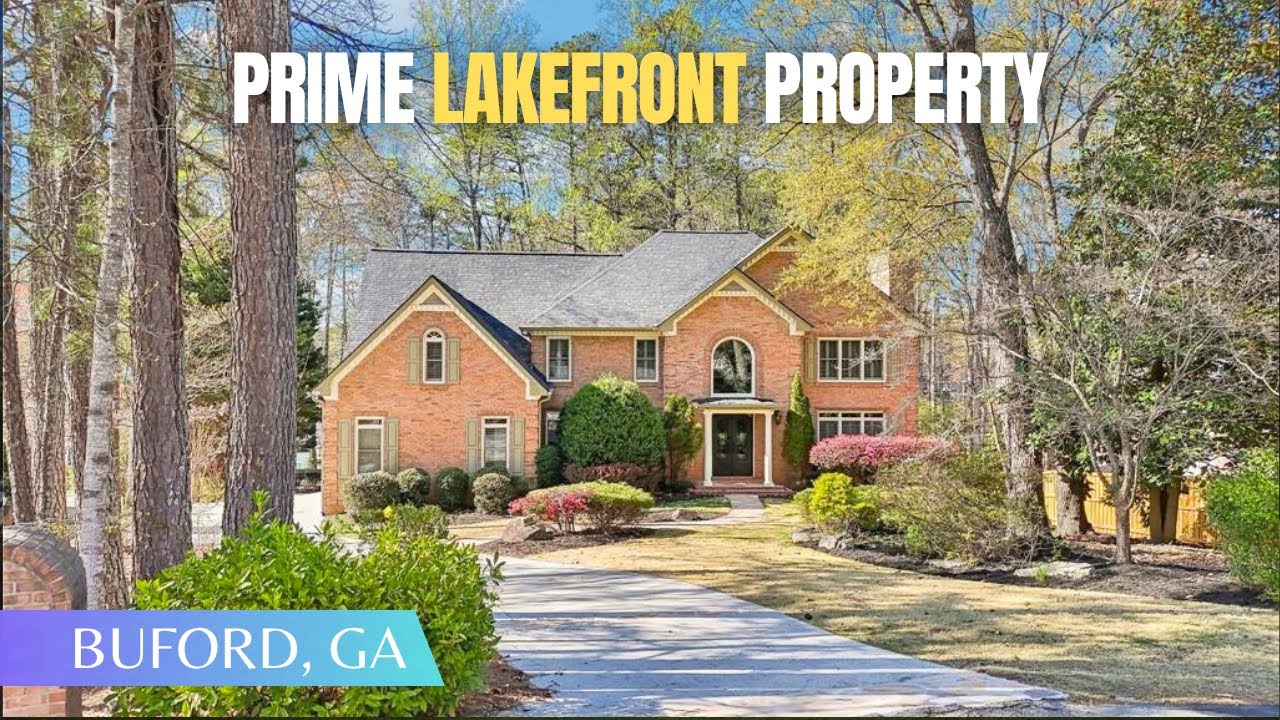 Stunning Lakefront Property w/Private Boat Slip + 2 Kitchens + 4 Car Garage + Gym + Sunroom FOR SALE
