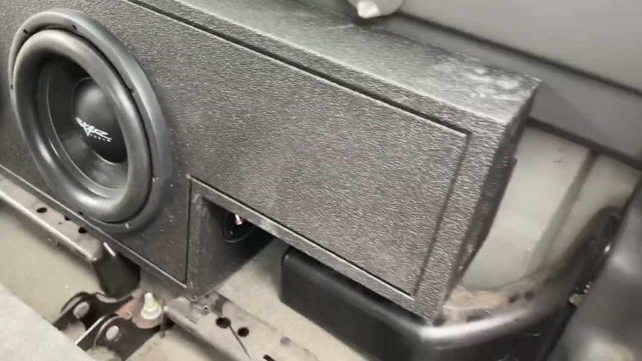 2006 GMC Sierra Crew Cab 2 10 inch subs behind back seat