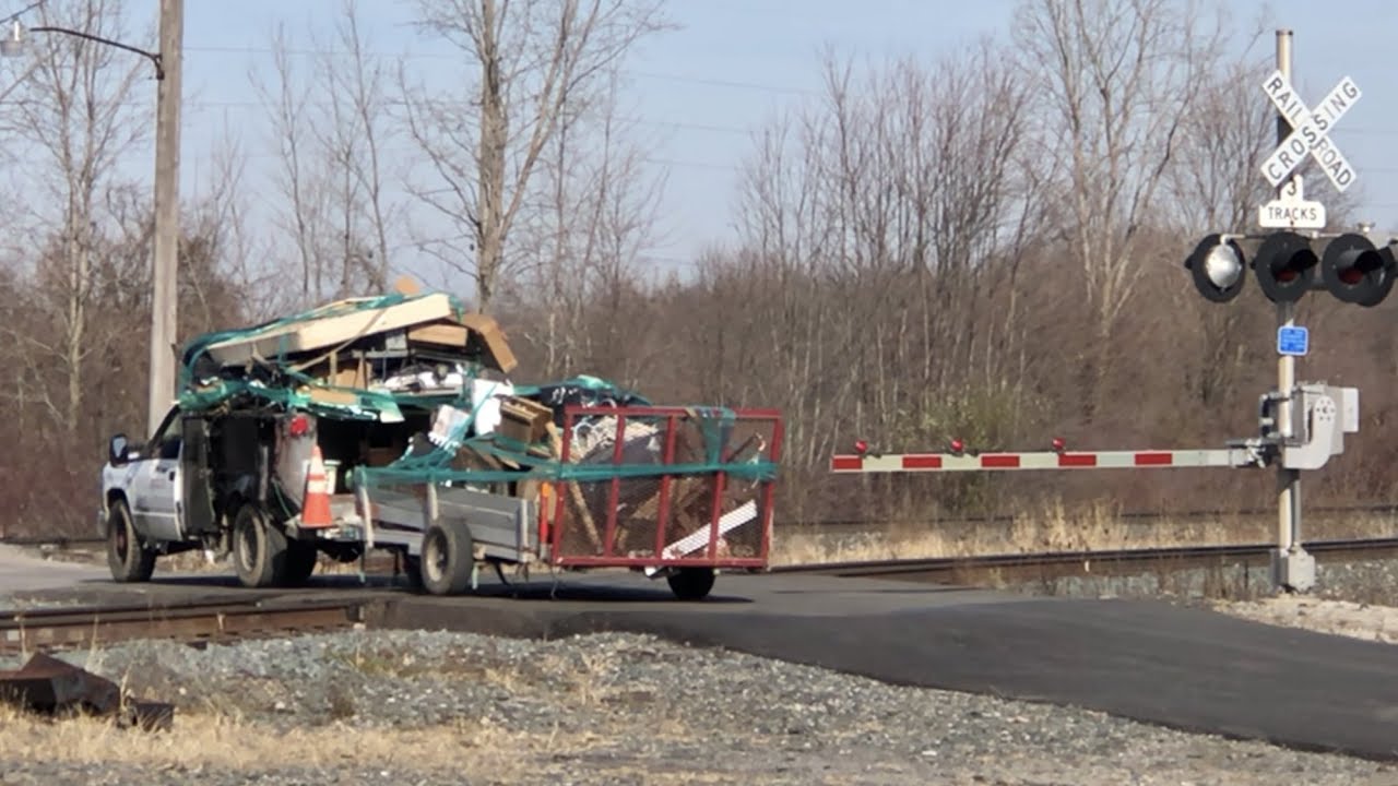 Truck With Trailer Goes Around Railroad Crossing Gates At 6 Track Crossing, RR Diamonds In Greenwich