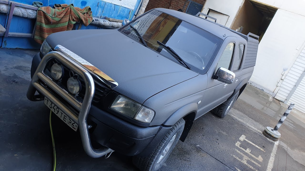 Mazda B2500 - U-Pol Raptor + Dinitrol (глубокая реанимация кузова)