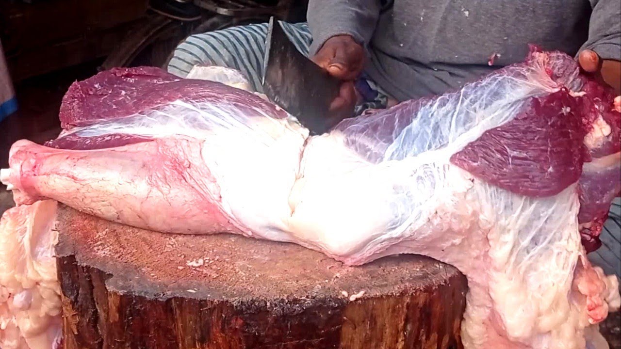 Biggest Cow Leg Cutting Skills ।। Expert Butcher Cow Leg Cutting At Village Meat Market.