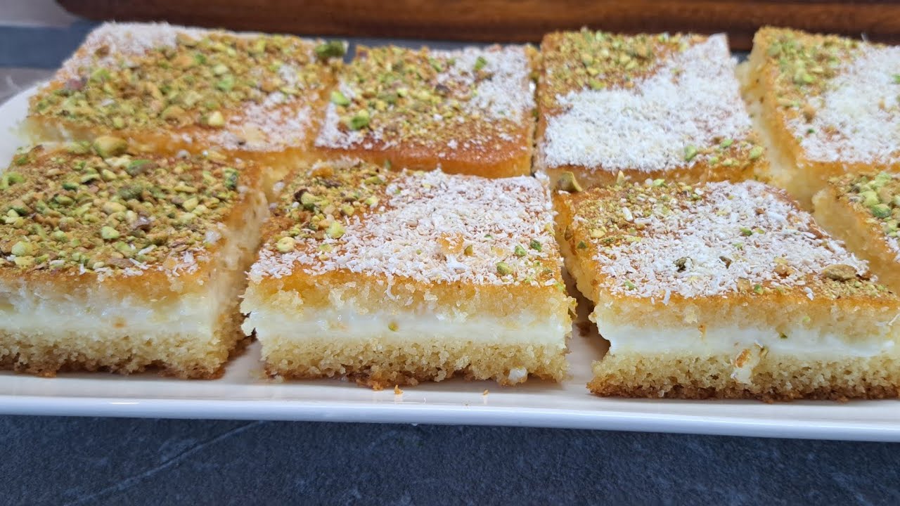 بسبوسة سهلة  بطبقة الكريمة هشة ولذيذة (Basbousa with cream, soft and delicious)