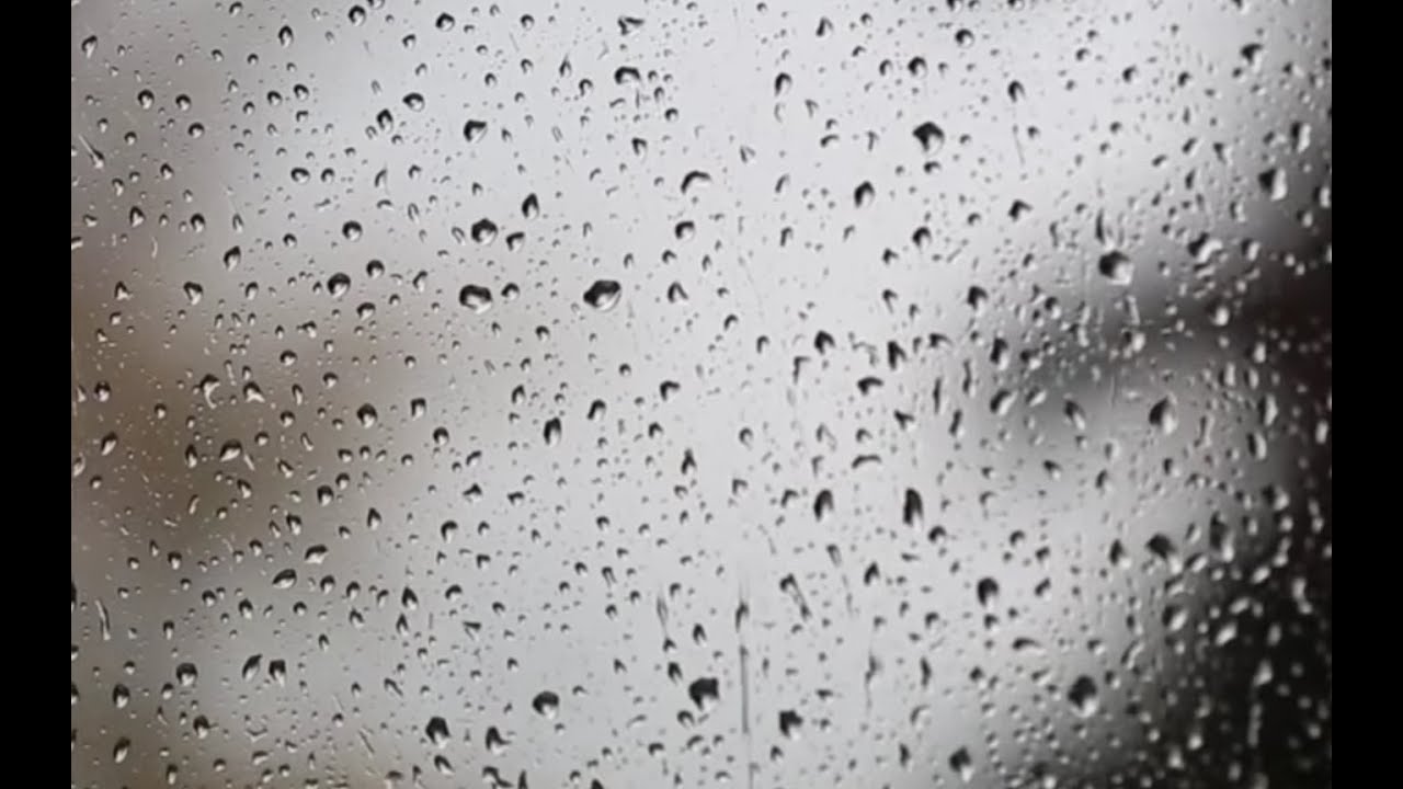 Rain pattering gently against a window, ASMR, no talking