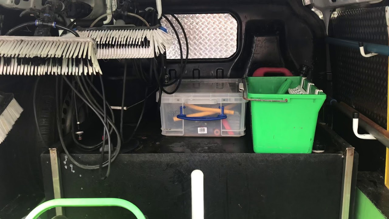 A Transit Connect window cleaning van