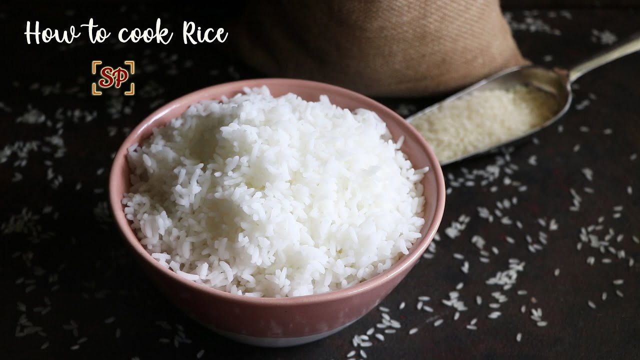 How to cook rice in open pot draining method