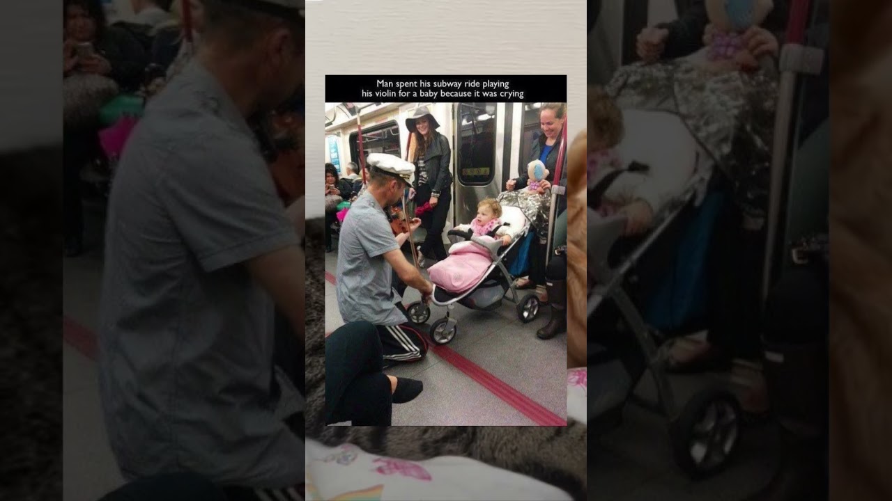 Man plays violin on subway to calm a crying baby&mdash;pure kindness. #shorts #facts