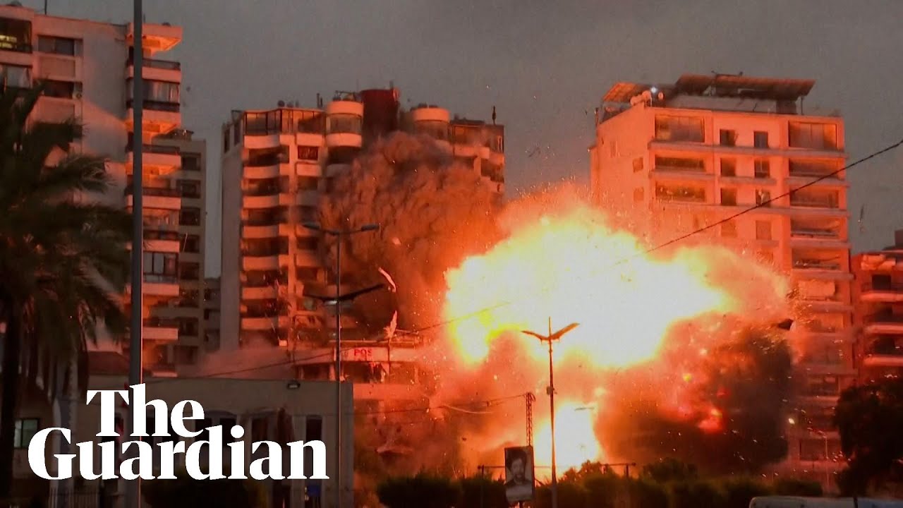 Israeli strike causes huge explosion and rocks building in Beirut