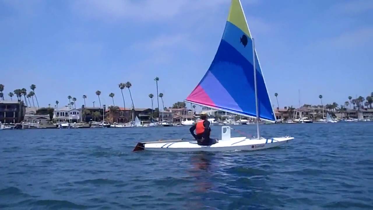 Henry downwind jibing in Sunfish on Alamitos Bay, Long Beach, 7-18-10