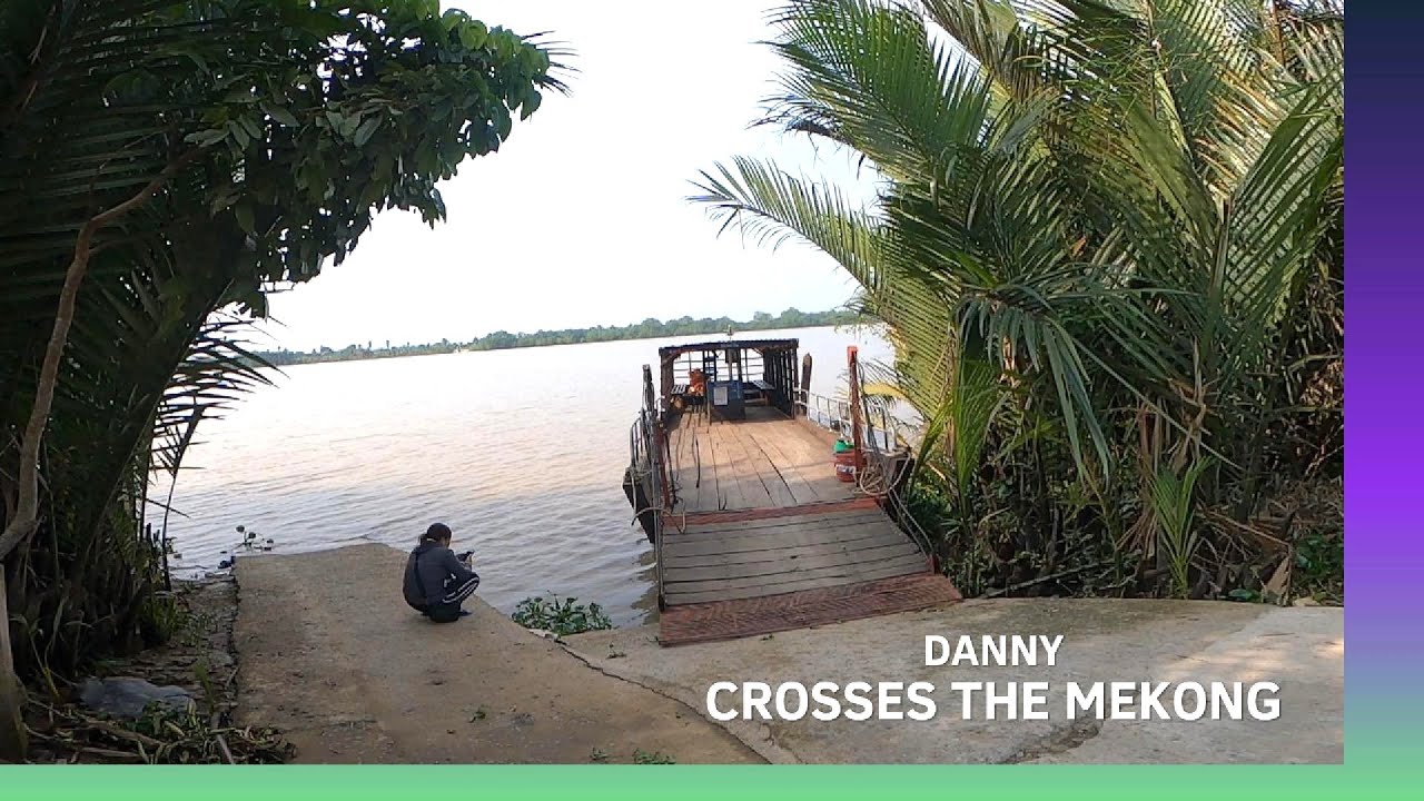 Danny crosses the Mekong River on his way to Ben Tre, Vietnam.