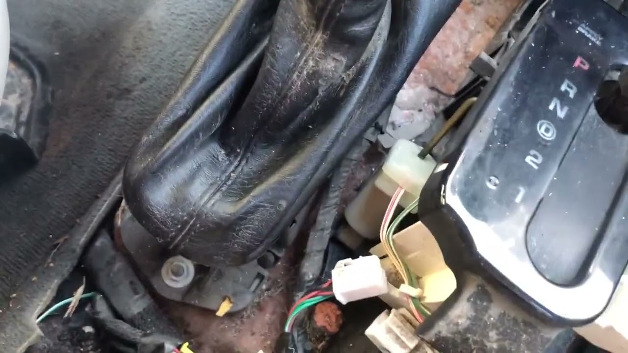 Jeep Liberty key stuck in ignition - fixing it by replacing the shifter and interlock cable, solved!