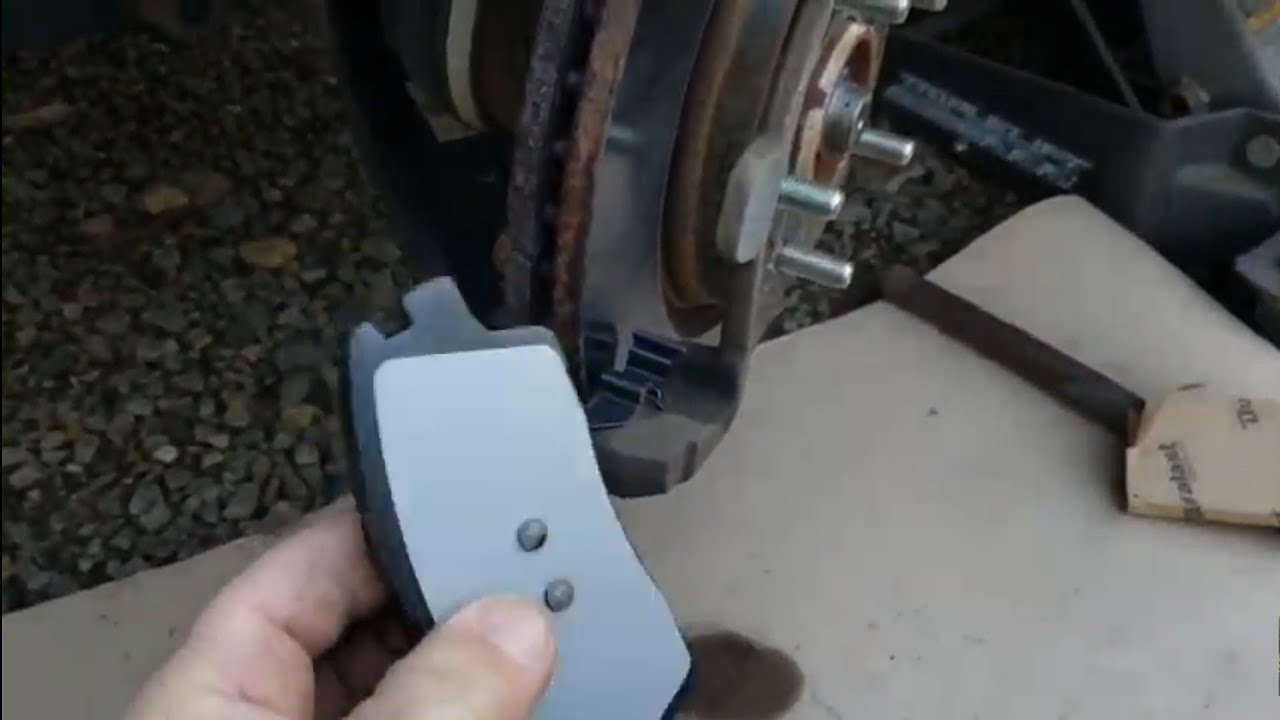 changing front disc brake pads  Kia