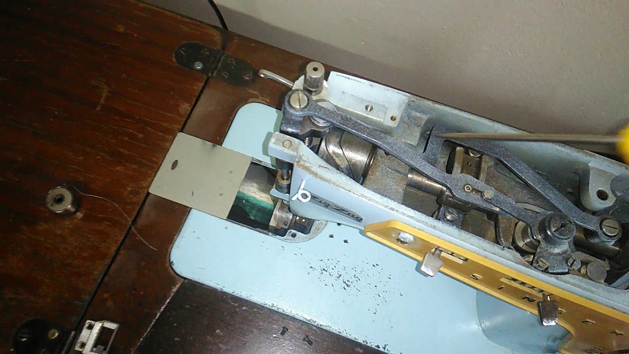 lubrificando maquina de costura singer zig zag 667