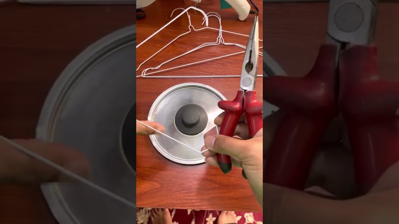 DIY POT LID KITCHEN CABINET ORGANIZER Made from used wire coated hanger