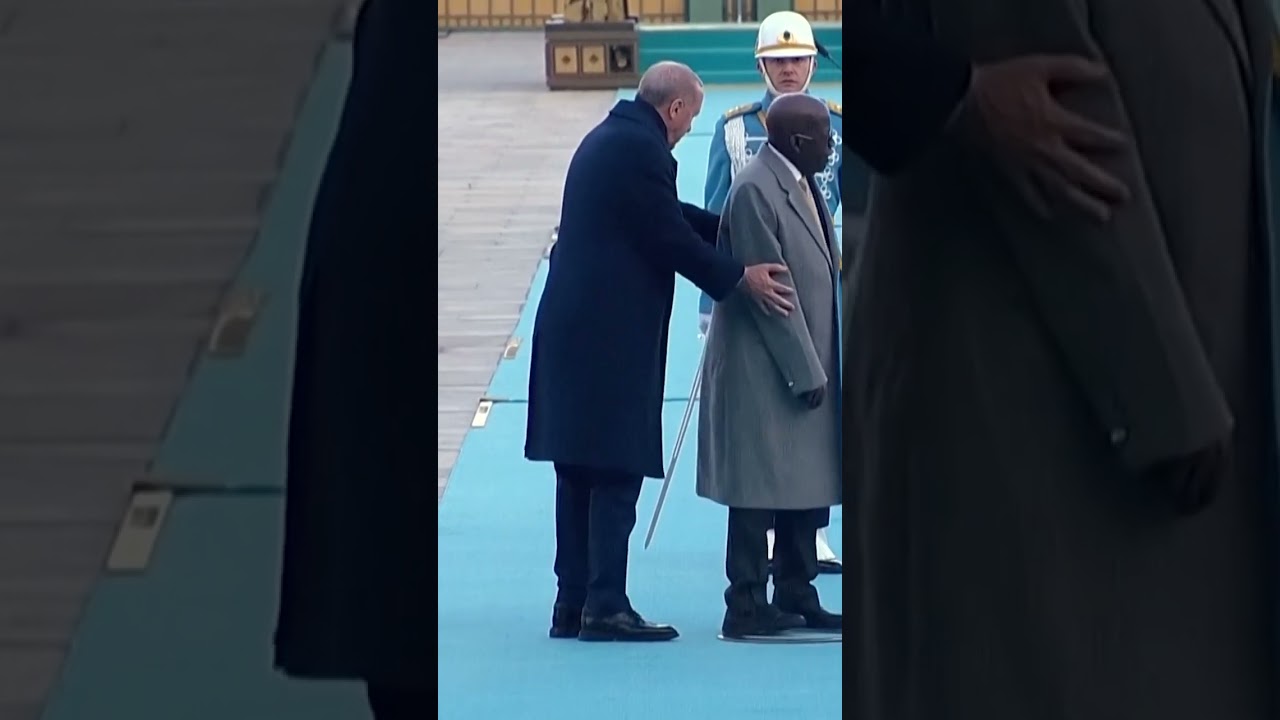 Nigerian President trips during welcoming ceremony