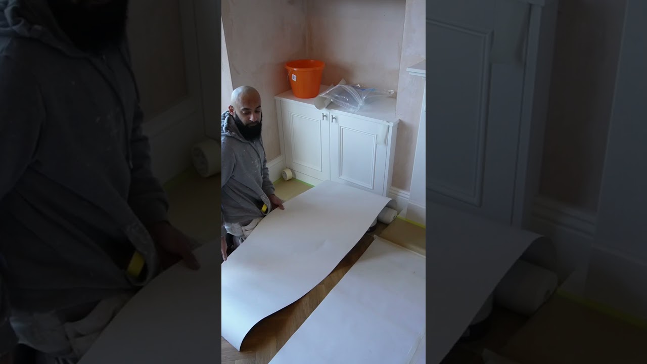 The Right Way To Unroll Hardwood Floor Protection #DIY #floorprotection #hacks #palpainters