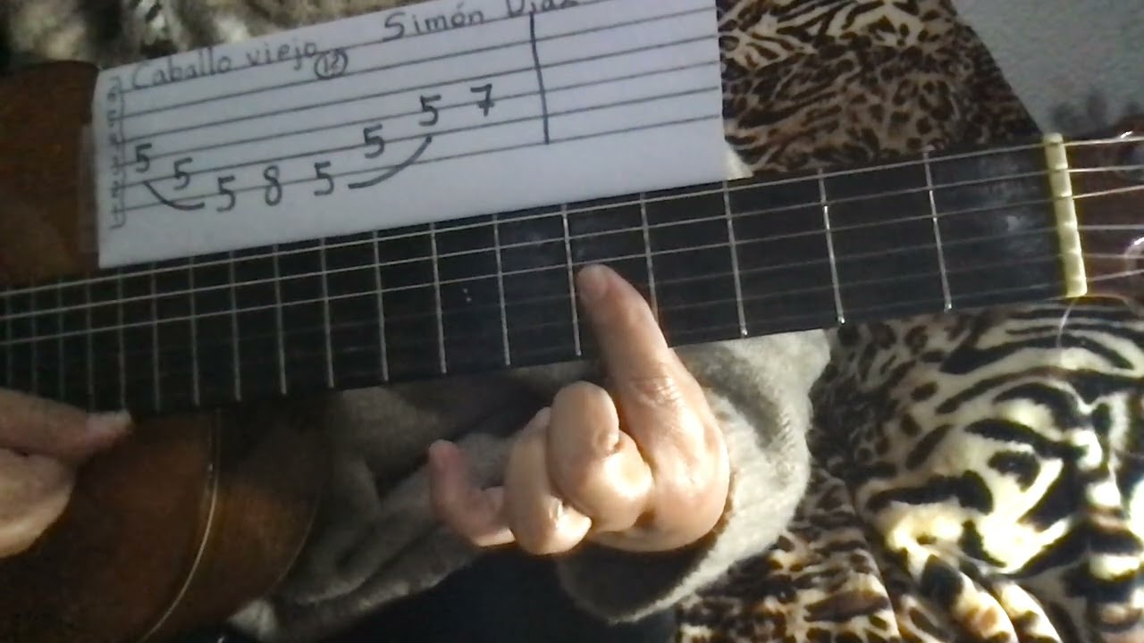 COMO TOCAR EN GUITARRA 