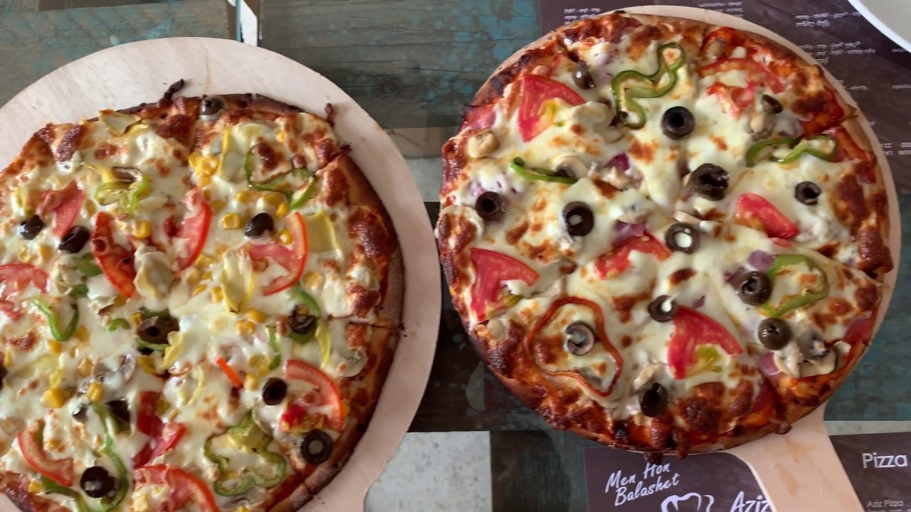 At the Bakery in Bechmizzine: A &ldquo;Lebanese Pizza&rdquo;, How it's Made! Tomato Sauce and Cheese...