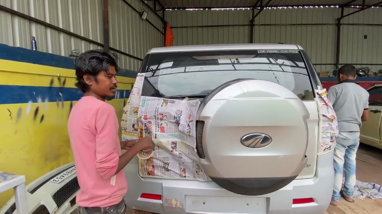 Mahindra TUV300 on process full body denting painting part=1