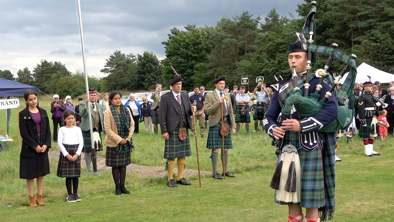 The Royal Guard of Balaklava Company salute the Chieftain during Ballater Highland Games in 2021