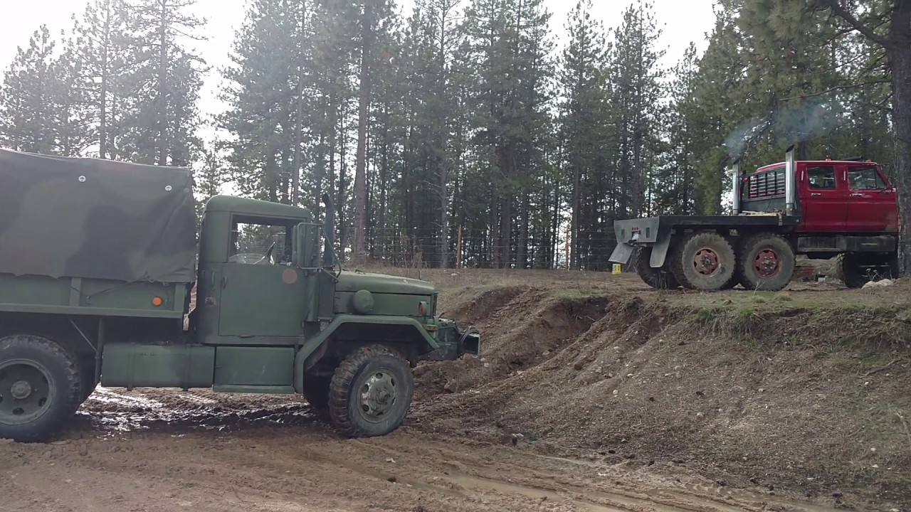 F700 6x6 and deuce and a half having fun in the mud.