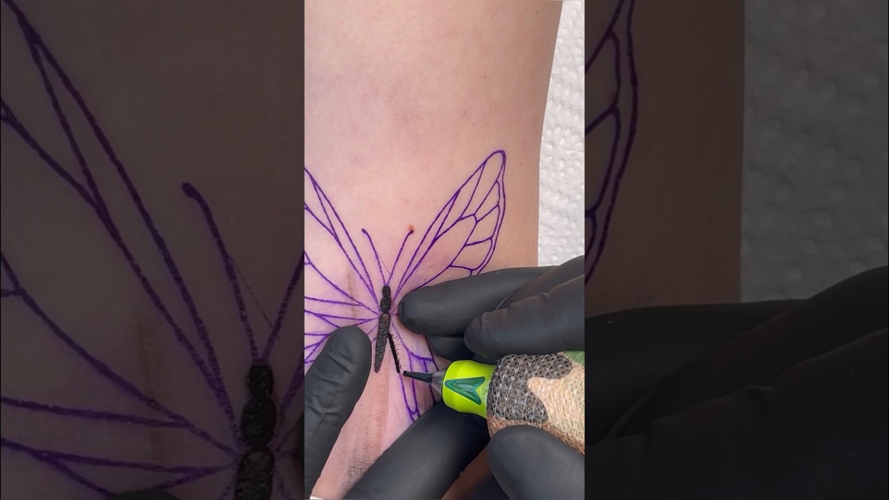 Small butterfly tattoo