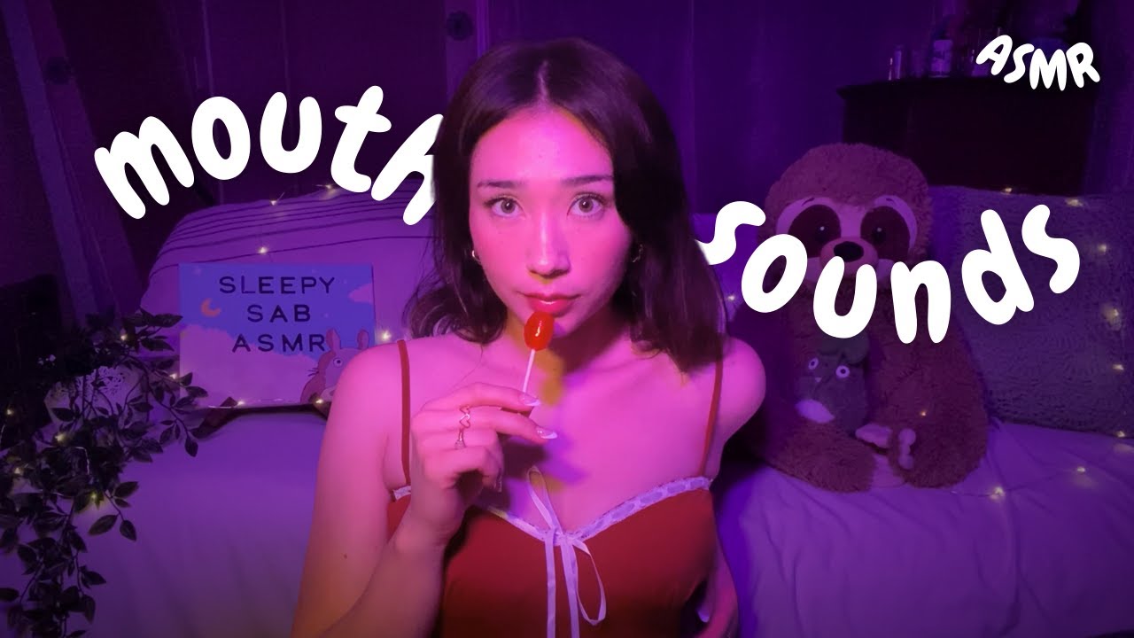 my first time trying mouth sounds 🍭 ASMR (hand movements, lollipop eating, & spoolie nibbling)