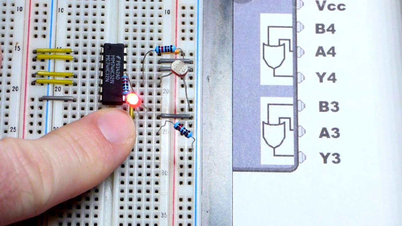 Quick 74HC32 quad 2 input OR gate IC with push button switch and light dependent resistor LDR