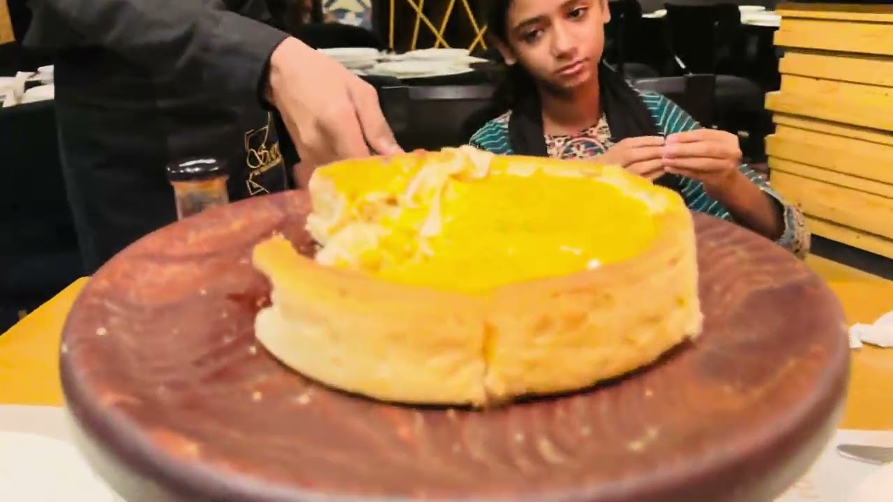 Butter chicken deep dish pizza                                   Sobremesa restaurant Karachi