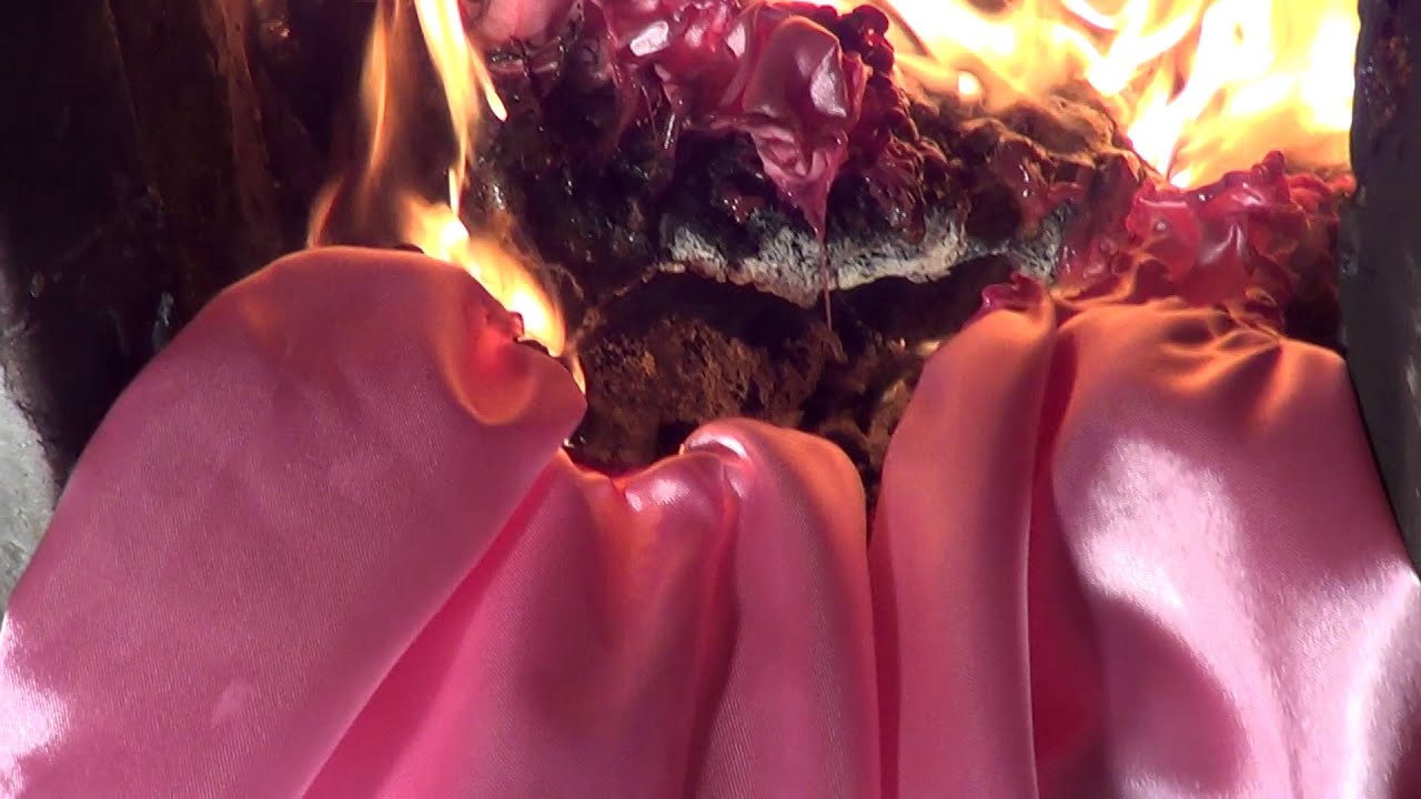 Burning old satin dress