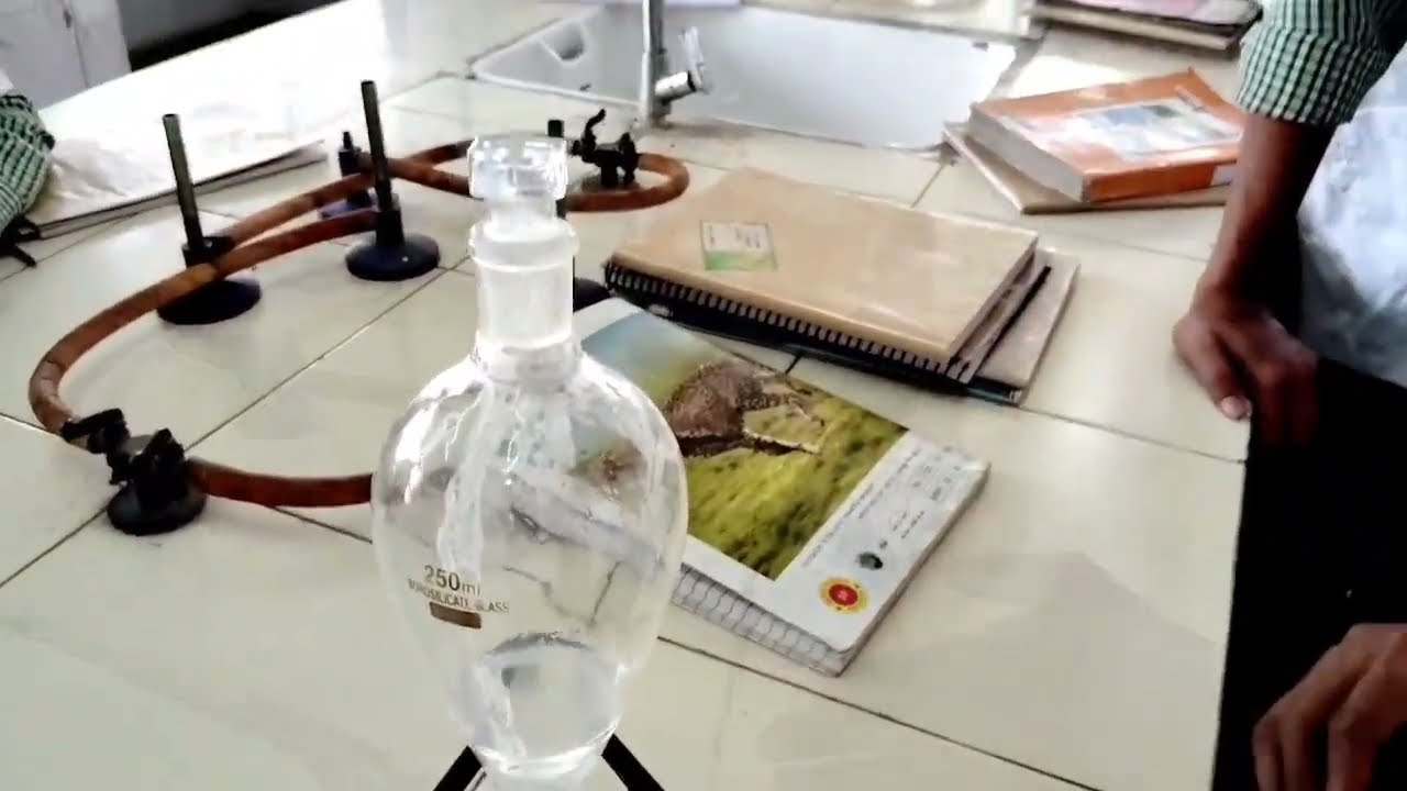 To determine partition coefficient of benzoic acid in benzene and water by Mukesh Kumar Tiwari