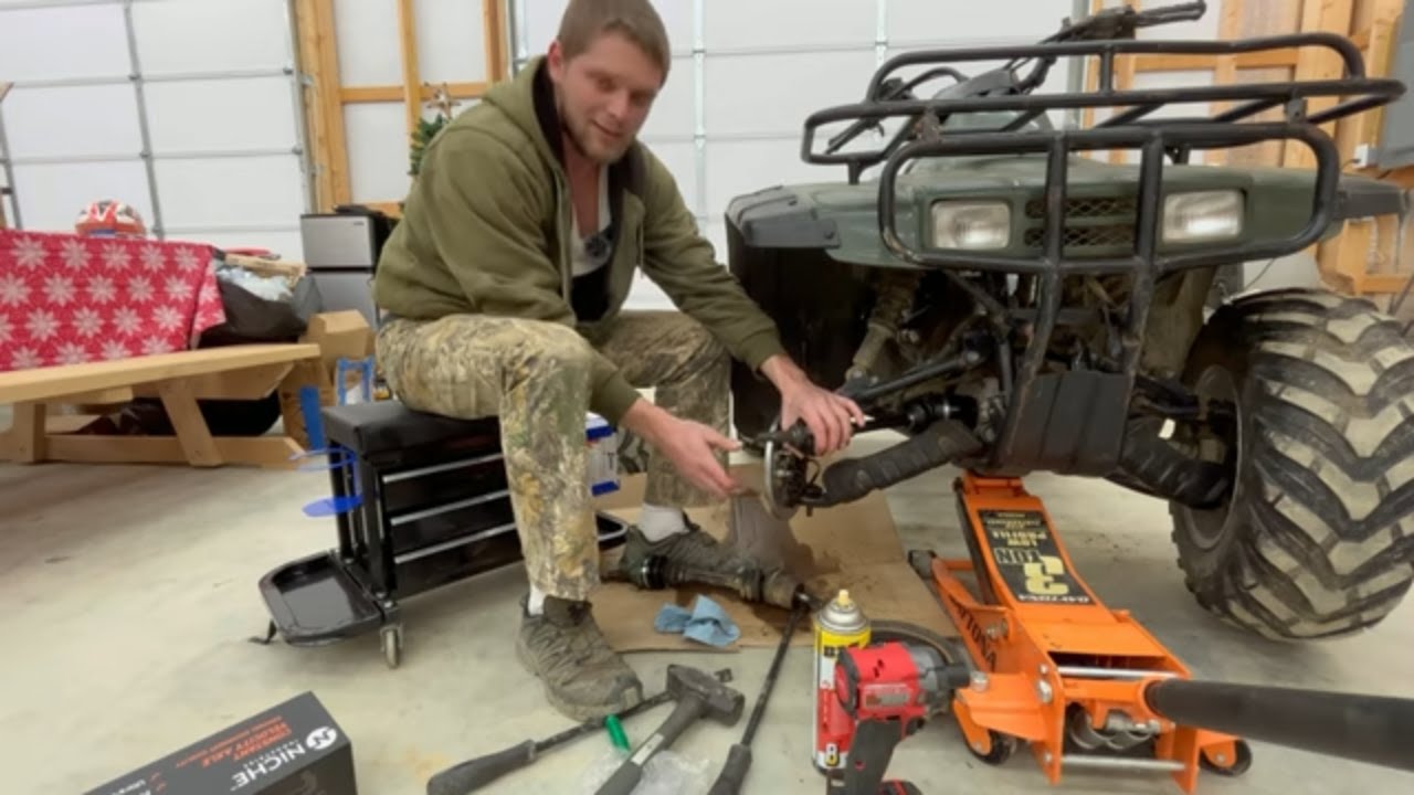 Honda Fourtrax 300 axle replacement  ( My First Shop Video)