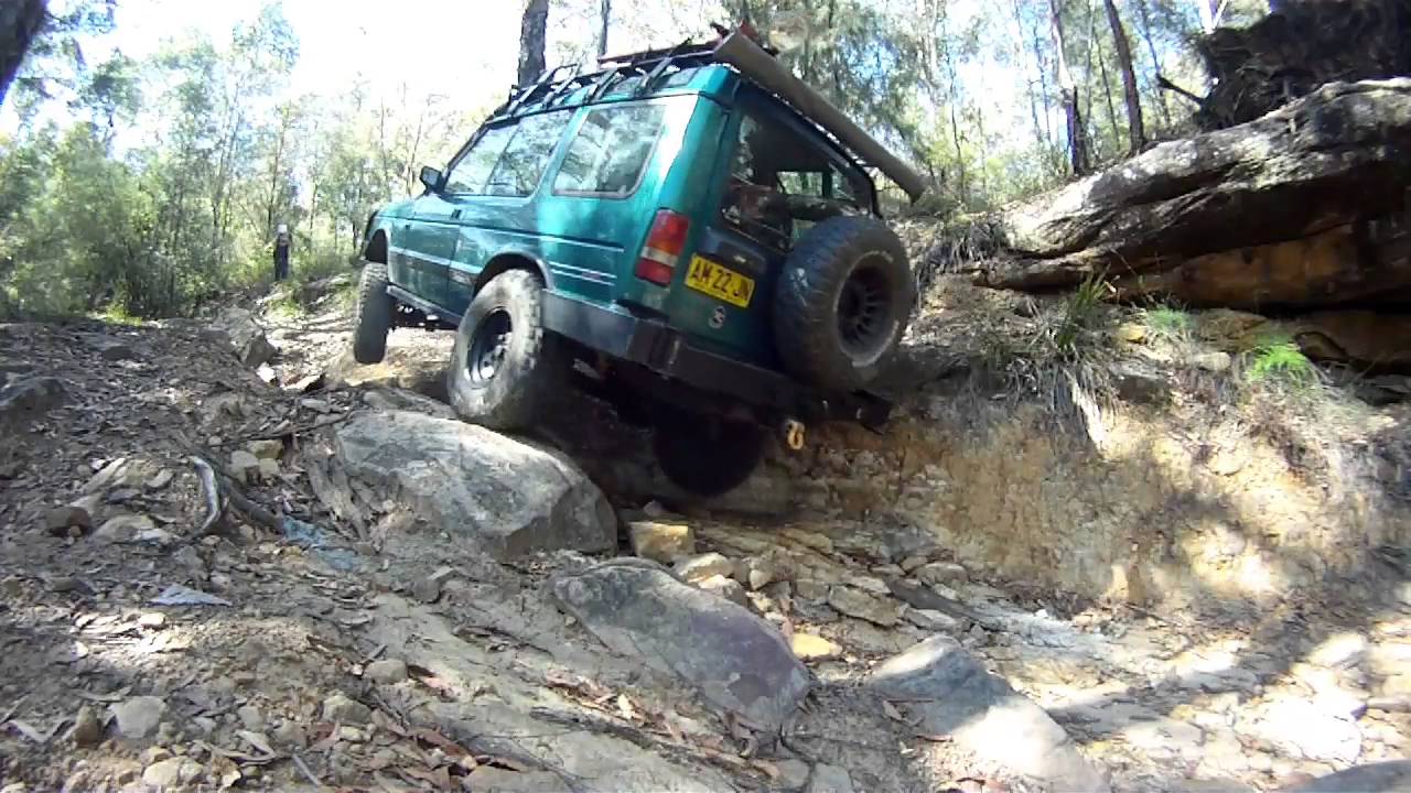 Stock Land Rover Defender vs Modified Discovery 1