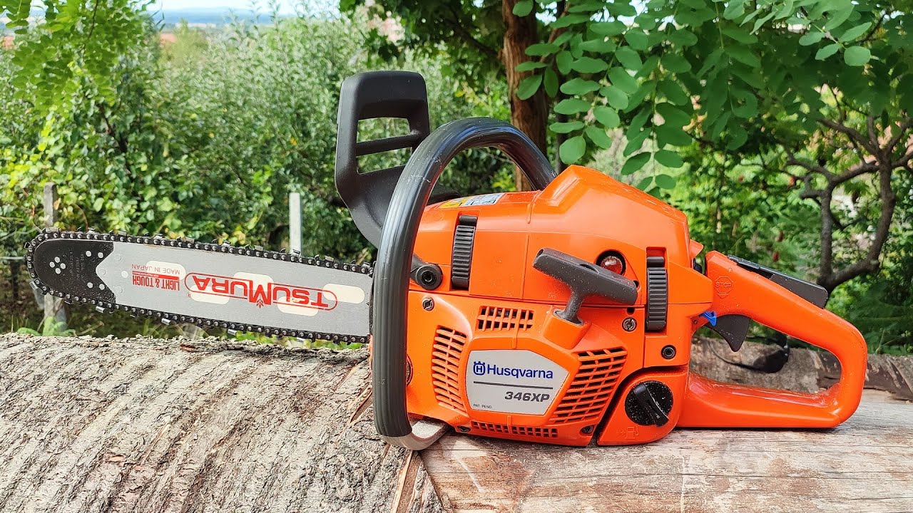 Husqvarna 346xp cutting with .325 and 3/8 1.3mm Stihl chains