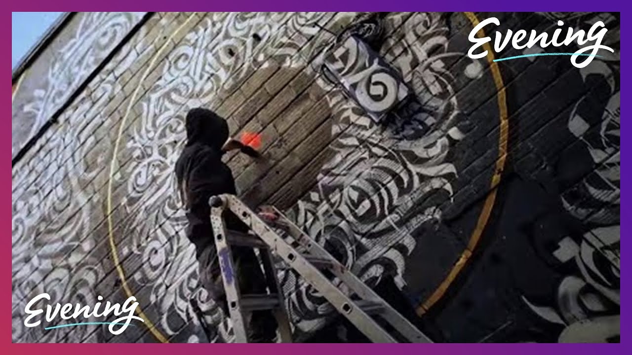Seattle artist paints the town in Calligraffiti