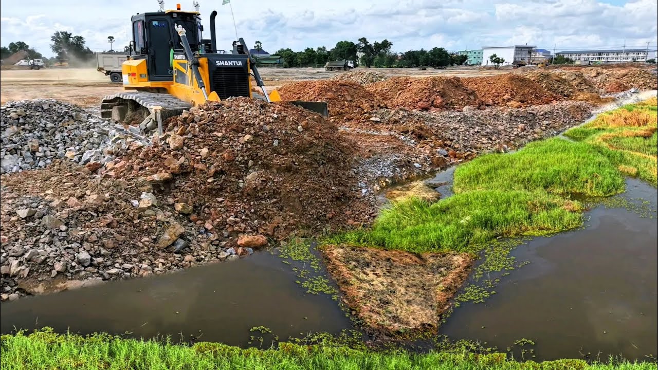 Start Size Big Projects Compacting Soil To fill in Gaps to Create a Construction Site Back Unloading