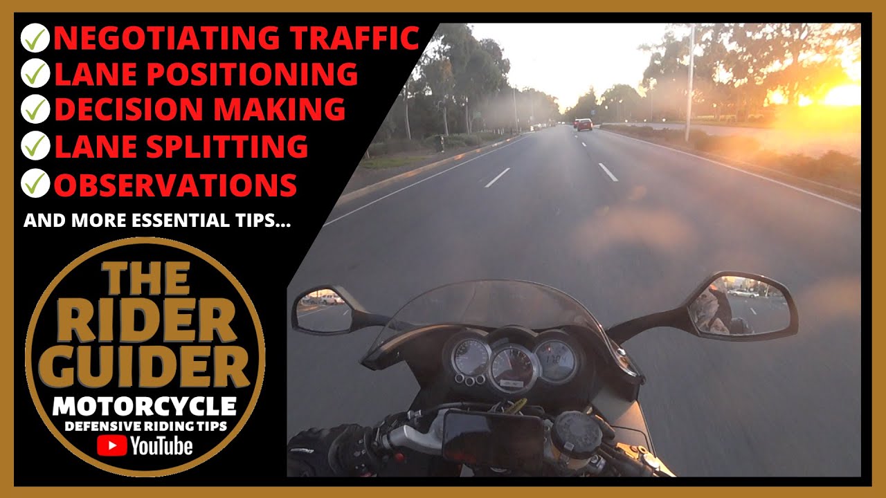 ON BOARD MOTORCYCLE TRAFFIC NEGOTIATING WITH THE RIDER GUIDER