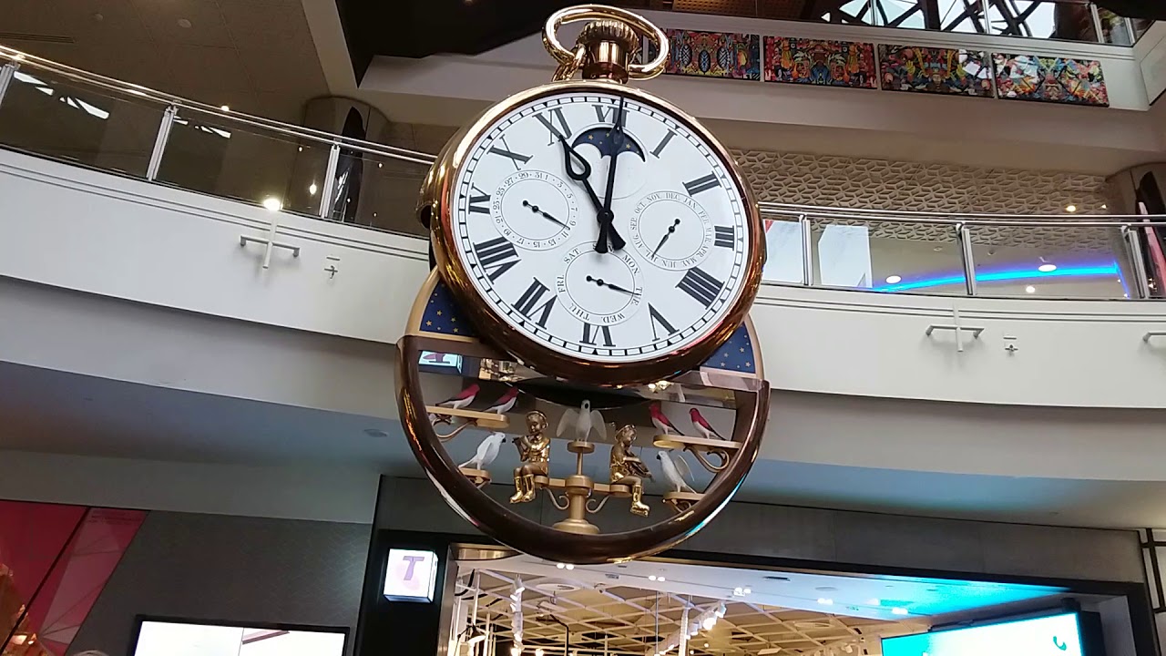 Melbourne central clock striking the hour.