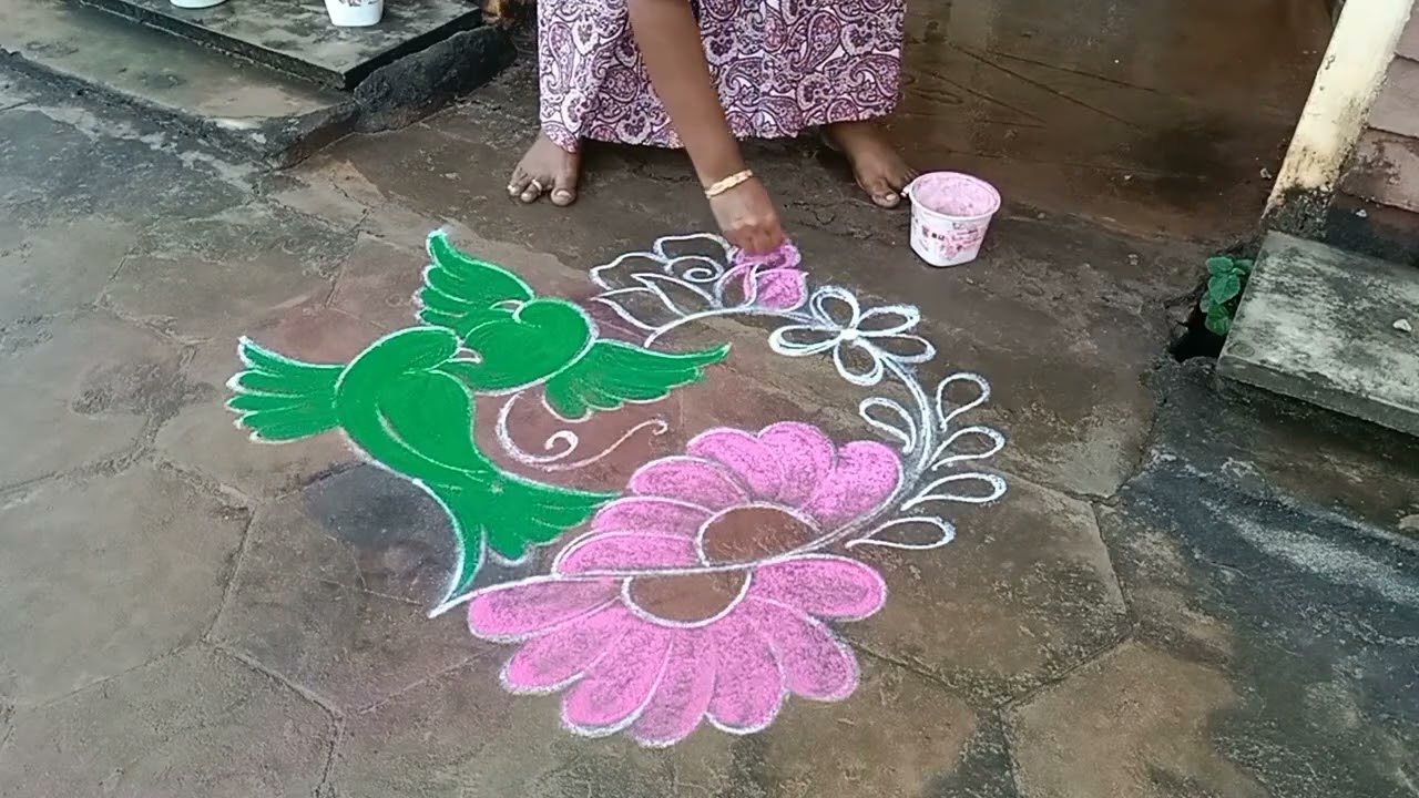 Beautiful parrot rangoli design