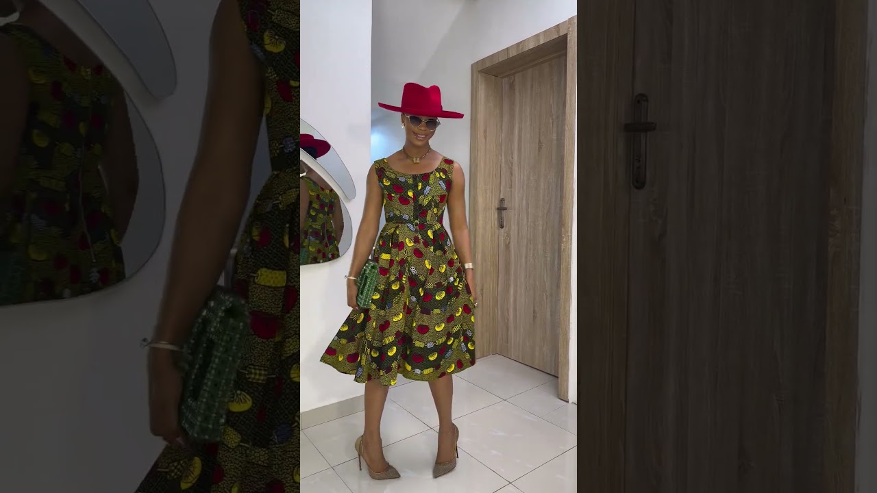 Step into effortless elegance with this sleeveless African print dress!