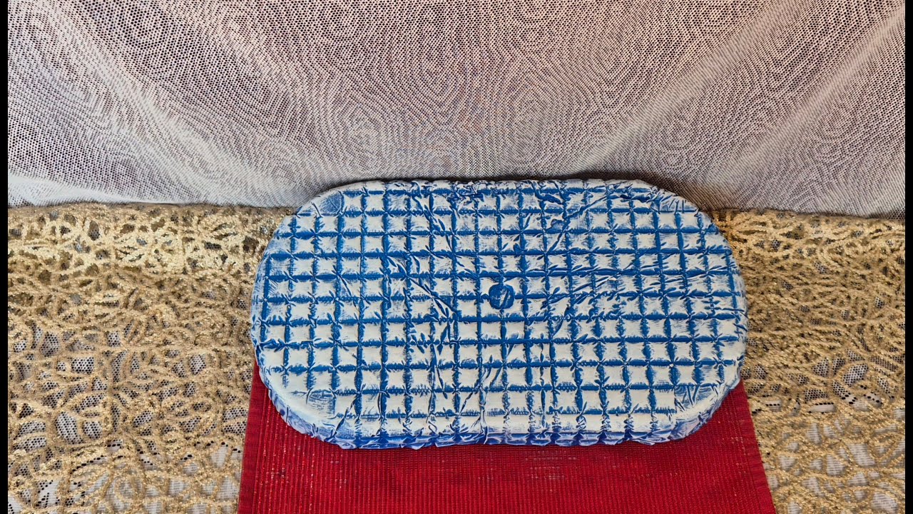 Concrete Tray with Embossed Patterns.