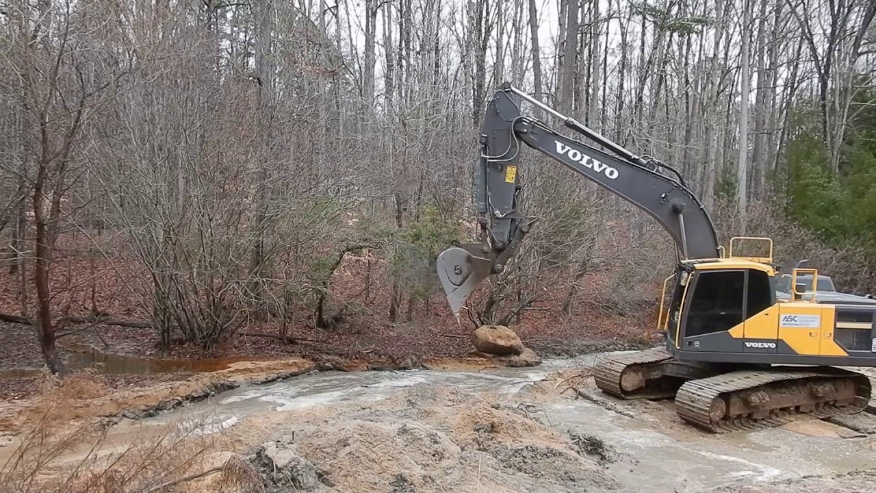 Excavator Stockpiling Sand