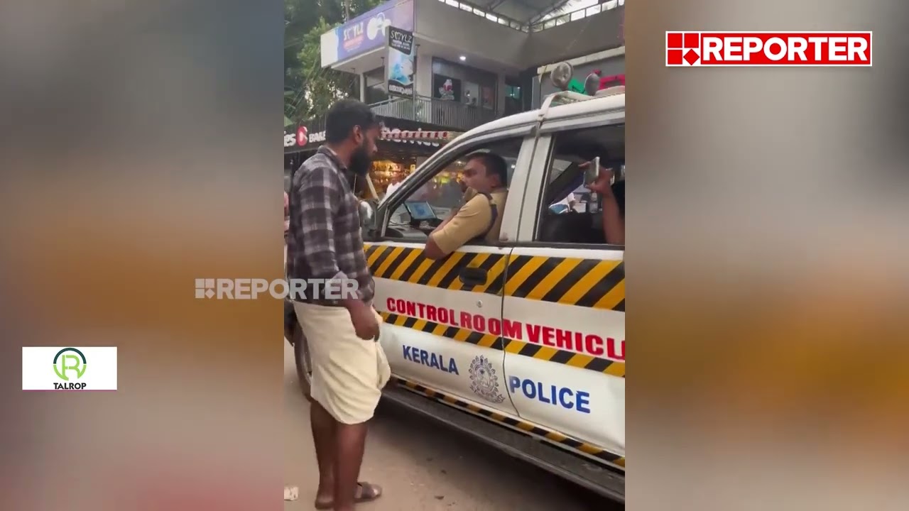 പൊലീസ് ഉദ്യോഗസ്ഥന് സീറ്റ് ബെൽറ്റില്ല; ചോദ്യം ചെയ്ത യുവാവിനെതിരെ നടപടി | Kannur | Police seat belt