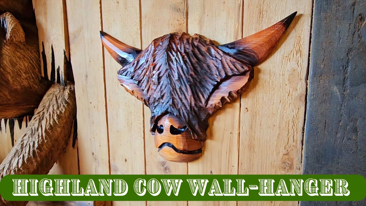 Transforming Wood: Highland Cow Head Chainsaw Carving