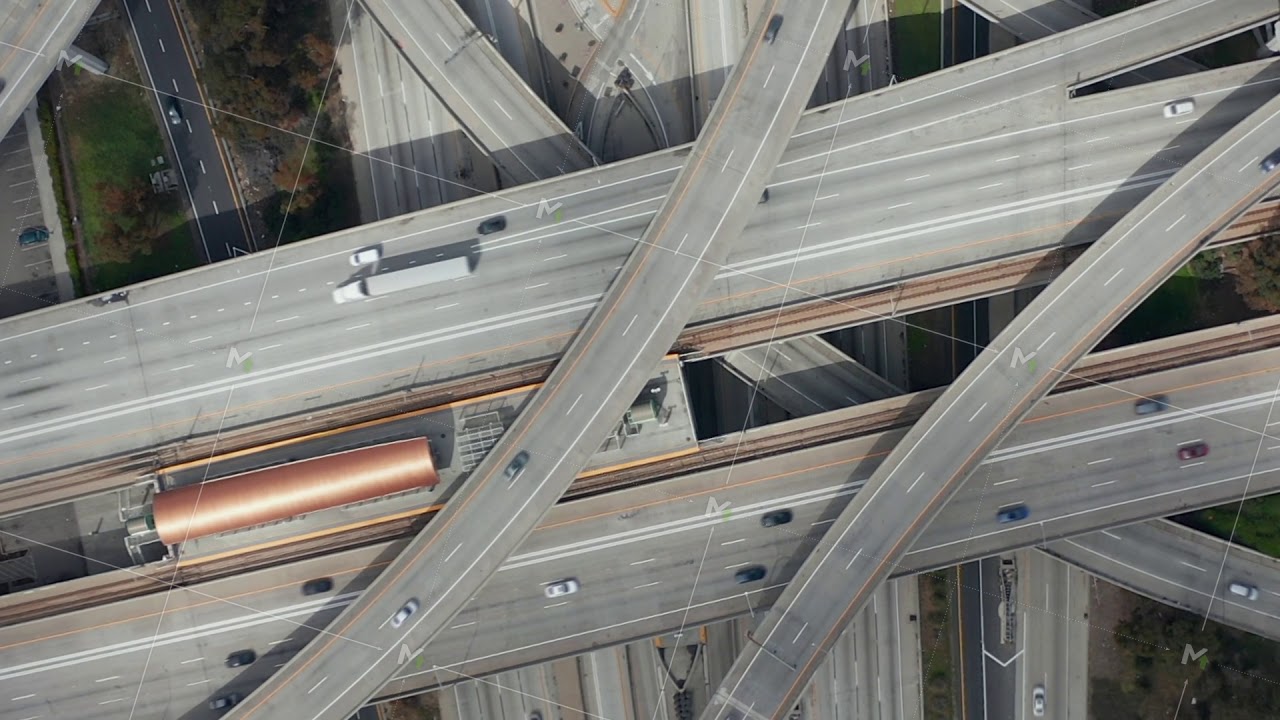 AERIAL: Spectacular Turning Overhead Shot of Judge Pregerson Highway showing multiple Roads, Bridges