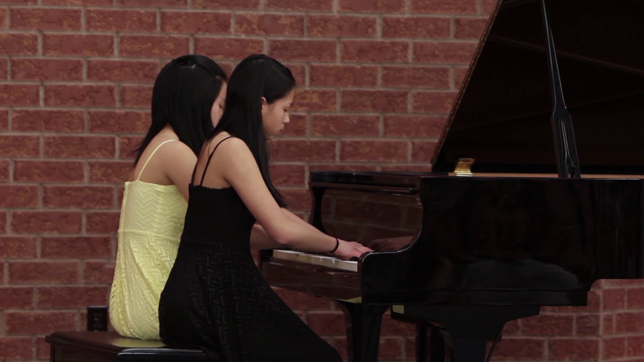 Janey and Emily Lao Performing 