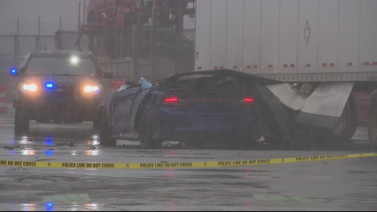 Speeding Dodge Charger gets wedged under semi-truck, killing driver | FOX 2 News Detroit
