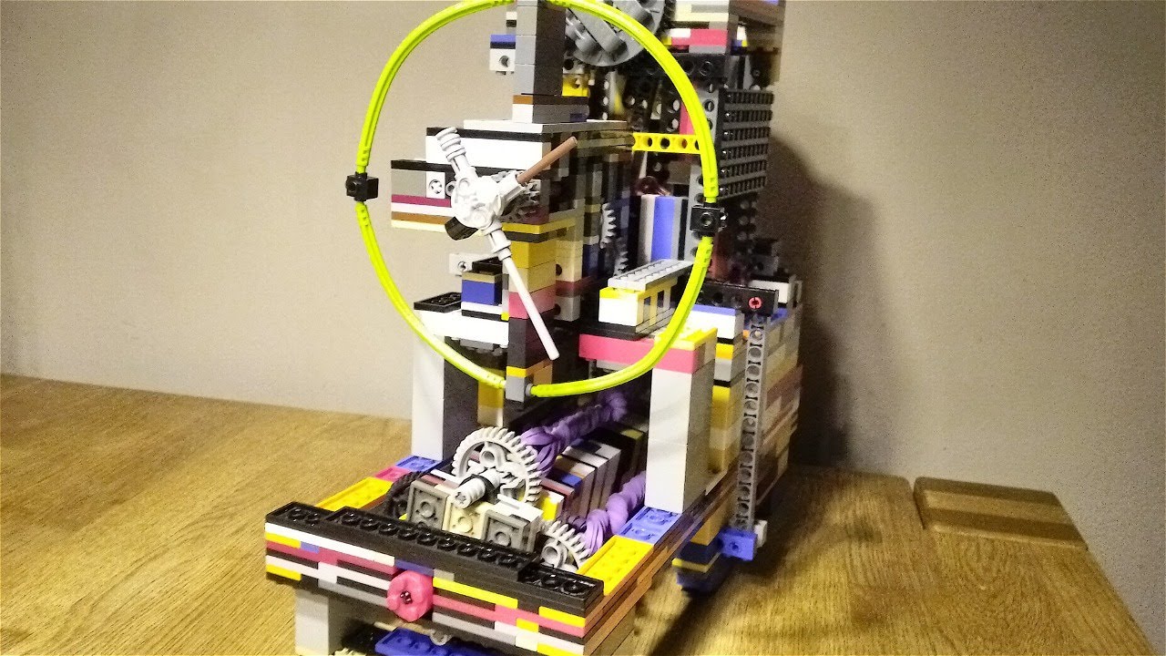 Rubberband powered lego clock with working pin lever escapement (proof of concept)