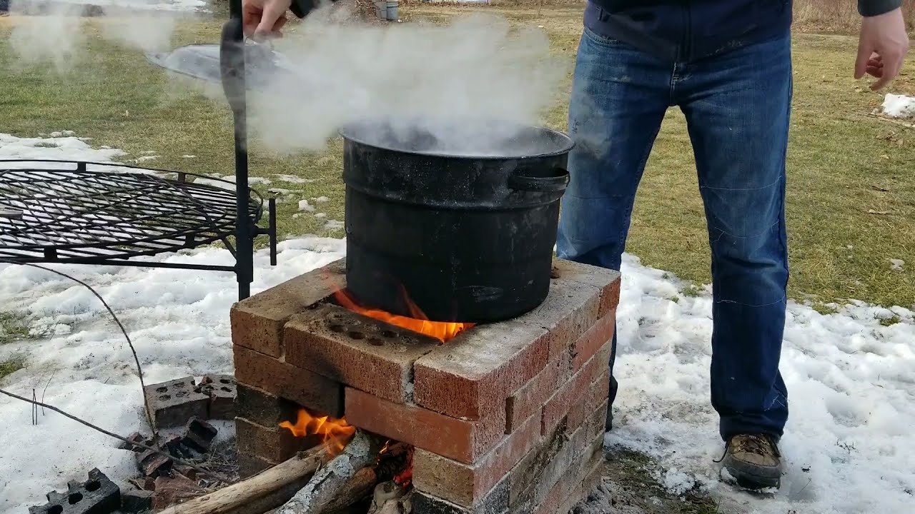 Boiling Maple Sap Over Our Rocket Stove